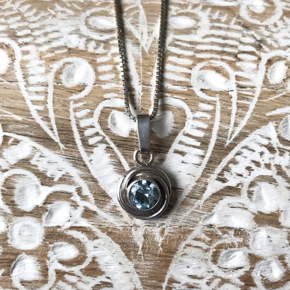 Sterling silver necklace with clear blue stone